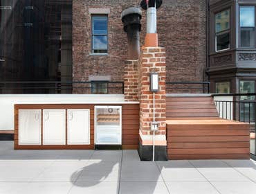 Upper West Side On this project we completely removed the the existing roof, installed a new roofing system, new roof deck pavers, ipe fence, and a Kit