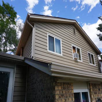 Photos by Exterior Recovery Co #1 Installed Structure foam backed vinyl siding with vinyl soffit and aluminum fascia.