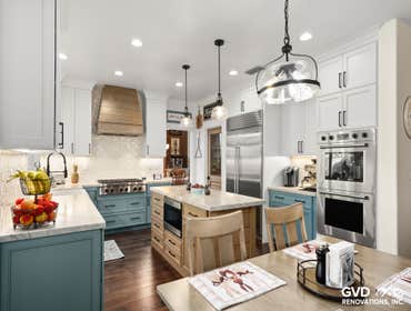 Complete Kitchen Remodel This full kitchen remodel features custom cabinetry, quartzite countertops, and a statement island designed for both function 