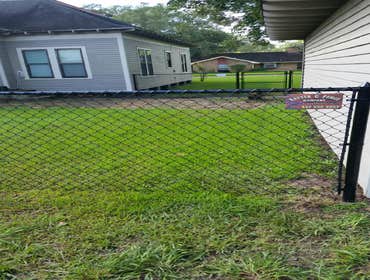 Black Chain Link Give us a call for all your fencing and custom entry needs. (337)532-3227.