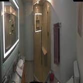 Photo(s) from Dhb Restoration, Llc Client wanted a tub enclosure turned into a walk-in shower. The area had poor lighting so the end wall was cut down 