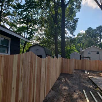 Photos by Everett's Construction Inc #1 A sun rise design with cedar materials