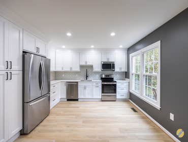 Gray Stunning Kitchen Makeover Before and After: A Stunning Kitchen Makeover!
Our team transformed the kitchen by adding rich contrast to the white ca