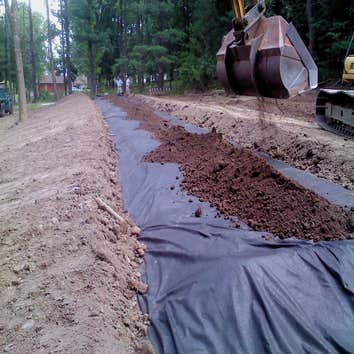 Mack Excavating Co Photos Drip Septic System installation in Montgomery County