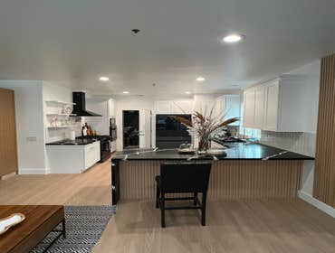 Photos by Us La Home Remodeling Inc #12 Kitchen remodel: new kitchen cabinets White shaker , with beautiful Black quartz countertop With white vans. Ne