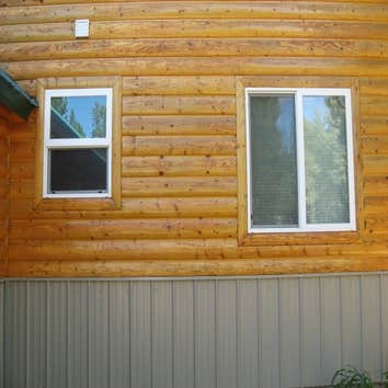Interior/exterior painting and staining three bedroom house, installing trims, complete repainting (7 colors),