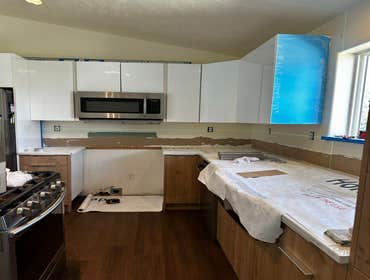 Kitchen remodel Full kitchen remodel:
LVP floor installation
Cabinet/ Countertop install
Vertical tile backsplash install
If you looking for best c