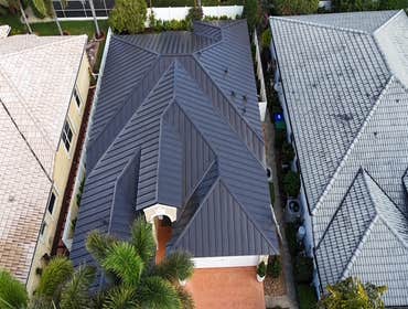 Photos by Gold Star Miami Corp #1 metal roof panels all are . 25 years warrantee