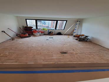 Photos by C&j All in One Property Solutions LLC #8 The homeowner requested a new wood flooring installation in the living room, foyer and bedroom to re