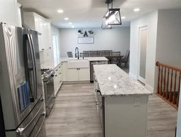 Photos by Adair Homes #2 Get Kitchen and Great Room. Remove non-load bearing wall to open up the great room