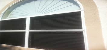 Residential Screens and BP Station Exterior View of Solar Screens provide privacy and Block Heat. Interior view reduction only 15%