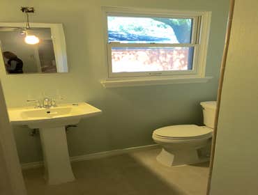 Complete 3 room remodel Bathroom, wash room, kitchen, mud room. Tile and wood flooring new cabinets relocation of laundry room custom hood vent