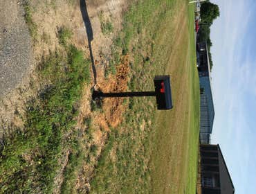 New Mail Boxes Dug holes, poured concrete and installed new mailbox post, and mailboxes