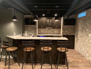 Clarkston Finished Basement by Majestic Home Solutions A beautifully designed finished basement! The space includes a exercise room, seating/living are