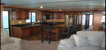 Project photos from Solid Surface Creations - DCI Interior of House Boat Granite Kitchen & Custom Solid Surface Steering Consuile
