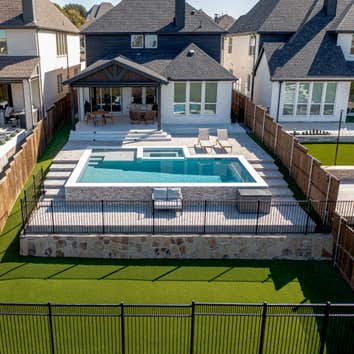 Carrollton, TX Luxury Custom Pool Builder in Carrollton, TX – This Canyon Oak Pools project transformed a sloped Carrollton backyard into a sophisticat