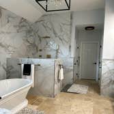 Photos by The Bathman #2 renovated entire bathroom, new tile, soaking tub, wall tile