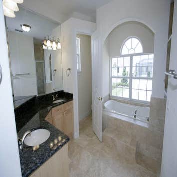 CUSTOM HOME IN REUNION FLORIDA AAA CONSTRUCTION COMPANY OF FLORIDA LLC. / BUDRON CUSTOM HOMES