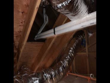 Photos by All Weather Heating and Air Conditioning Two complete HVAC systems including ducting, to be installed in two phases; pictures shown are from 