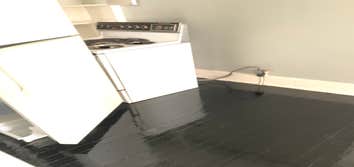 Photos by Flaugh's Construction and Design #2 Black floor stain with polyurethane topcoat