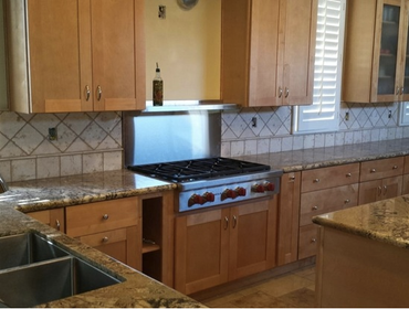 Traditional Kitchen Remodel in Northridge This Northridge home gets a kitchen updated while keeping traditional aspects with wooden cabinets and granit