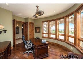 Photos by Sequoia Homes LLC #1 This Tuscan/Mediterranean style home is truly one of Mohave County's finest luxury homes. Over 1 acre of property in the