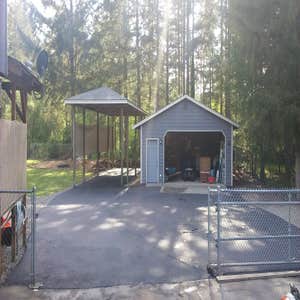 Auburn Driveway Exspansion & RV Parking Asphalt Paving of a driveway expansion and RV parking area included fine grading for drainage, crushed...