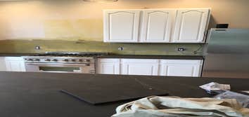 Photos by Top Floor Home Restorations #3 Set cabinets and countertops