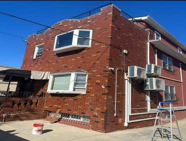 Photos by Quick Contracting LLC #1 At this work site Quick Contracting performed brick pointing and lintel change .