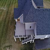 Photos by Define Decks LLC #1 This deck has it all. Helical pile footings, Azek decking, Westbury Riviera railing, Miratec trim and post wraps, and lig