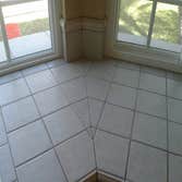 Kitchen counters and backsplash Kitchen counters remodel. 6x6 porcelain tile straight with v-cap trim and 6x6 porcelain tile on diagonal with design on