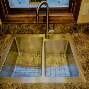 Sink Install/Replacement Installation of Sink, Garbage Disposal, and New Piping