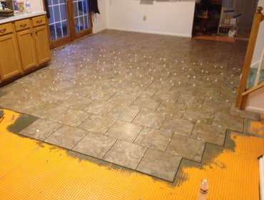 New tile and hardwood Before and after shots
We removed all of the old vinyl and "builders grade hardwood and installed new tile and per stained tongue