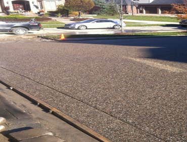 exposed aggregate Driveway Photo by Potoroka Concrete Macomb MI