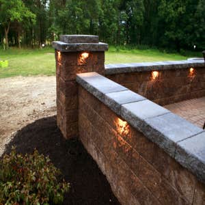 Hardscape Patio The patio renovation consisted of adding sitting walls, columns, a fire pit and a lower patio area to an existing patio.