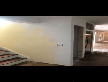 Smooth plaster finish in McMurray We hung over 100 sheets of plaster board. Then we basecoated it. And finished it with lime and gauging then troweled 