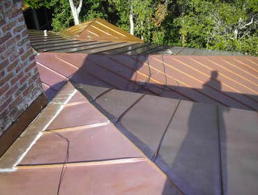 Applied Roofing Technology / Projects Copper Roofs, chimney caps & conductor head.