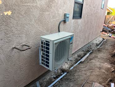 Photos by RK Mechanical Air Services Inc. #12 Scope of work
Ductless System Installation
Multi-Zone System Outdoor Multi-Split Heat Pump 2 zone, 18 000