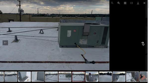 TPO Re-Roof — HVAC RTU & City Skyline — Commercial Entertainment Venue — Denver, CO