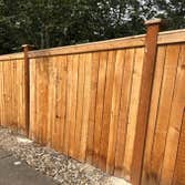 Photos by Lopez Solution Paint LLC #3 on this project we do pressure wash the entire fence and apply two coats of stain
