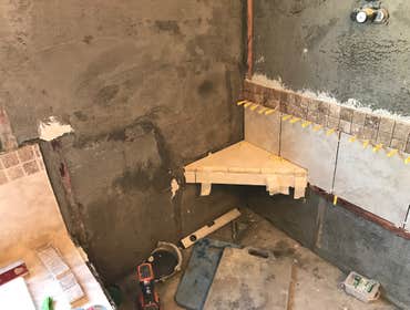 Photos by Griffin Tile & Marble Co #1 Master bath remodel. Remove PVC shower insert , remove separating wall , install new tile shower matching the til