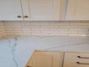 Fine Design Remodeling resume painting, frame, tile, cabinet install, shower, more.