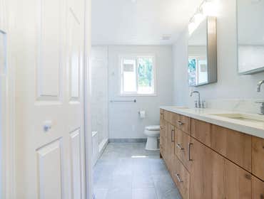 Streamlined-Chic and Radiant Bathroom Design | Everett, WA Beautiful custom Shower and Bath remodel. Relocation of the shower, toilet, and vanity in or