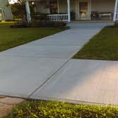 50' Sidewalk 26' Walk way to house and 10' Driveway apron 1 Month after pour