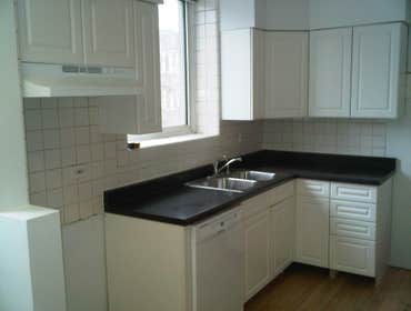 optima views condominiums Remodeling of entire Kitchen And Bathroom new cabinetry, flooring, and stone wall .