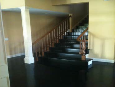 J C M Construction Project Installation of all new wood flooring and tile throughout house. Installation of fireplace tile, new kitchen counter tops, 