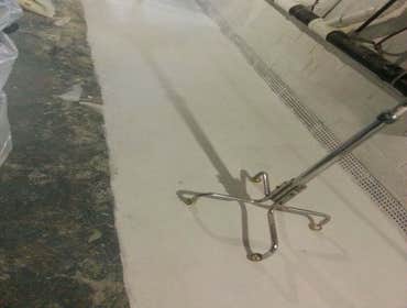 French Drain Installation We recently installed a french drain in a basement. Check out the before and after photos!