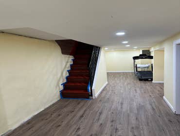 Photos by Your Expendable Services LLC #1 Basement remodeling project completed with new framework, walls placed and painted. New recess lights and LPV