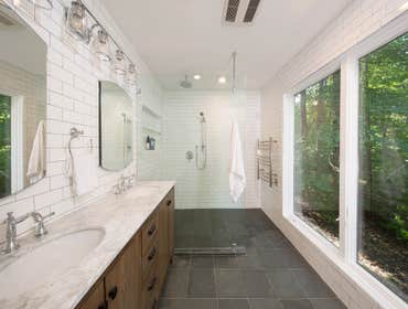 90s Modern master bathroom Large master bathroom renovation with fixture relocation on this 90s Modern home.