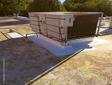 Commercial Roofing | Flat Roof Repair | Roof Coating Application Professional commercial flat roof repair in Wilmington, NC by RGR Construction & Roofi